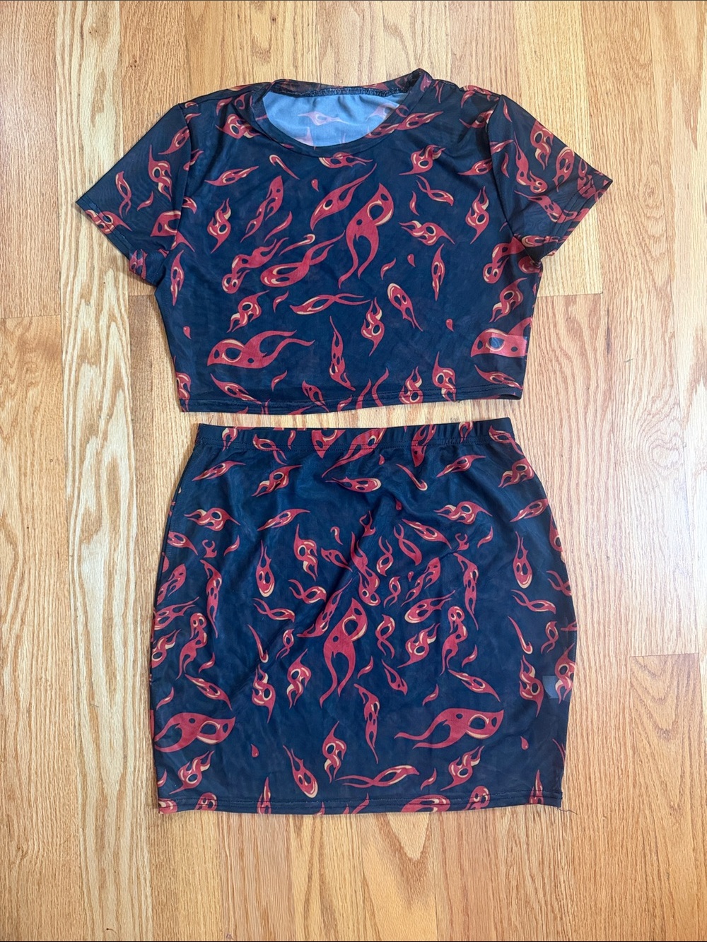 Black Two-Piece Mesh Crop Top & Skirt Set with Red Flame Print